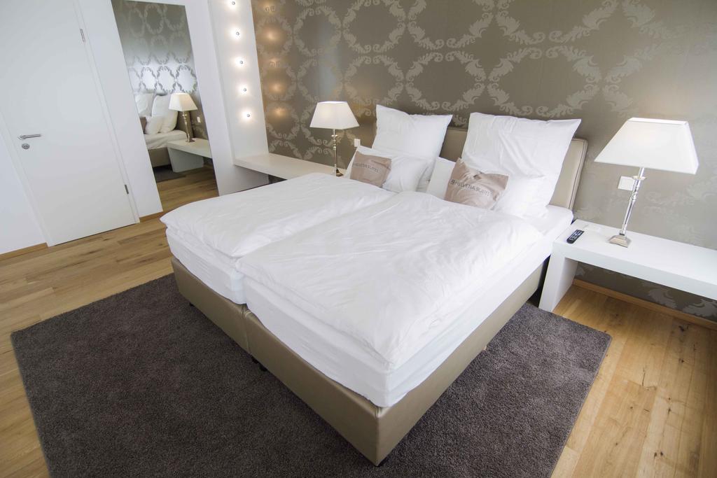 Helvetia Suites Düsseldorf Rom bilde